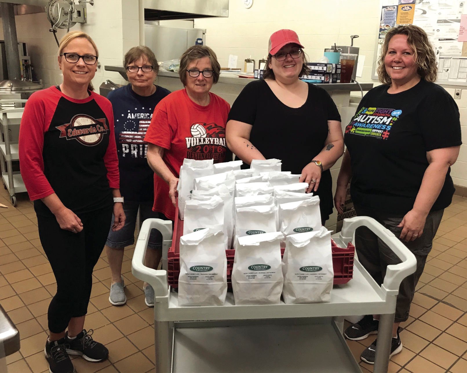 COUNTRY Financial donates lunch bags for meals for students
