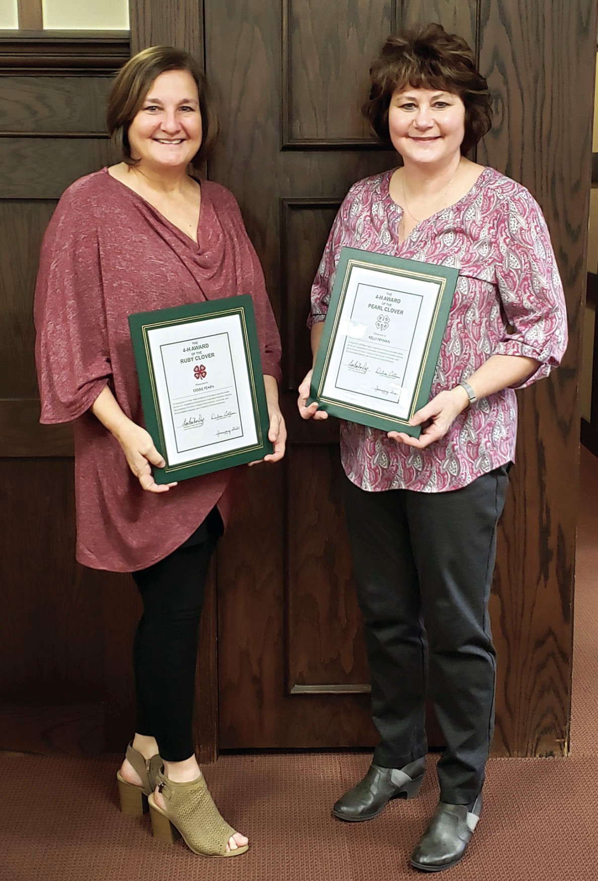 Debbie and Neil Fearn, Kelly and Wes Fryman recognized by EC 4-H for years of service